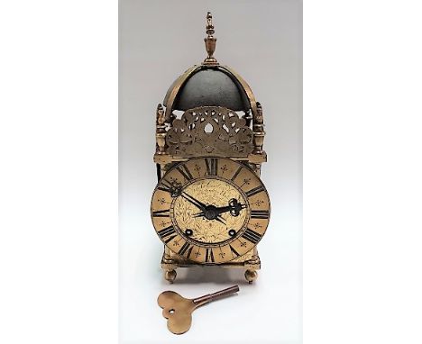 A 17th Century brass lantern clock case with replacement two-train movement, the 6.5in chaptering signed Nicholas Coxiter Nec