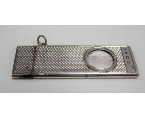 Modern silver engine turned fob cigar cutter of rectangular form, length 6cm, maker W.M., Birmingham 1977