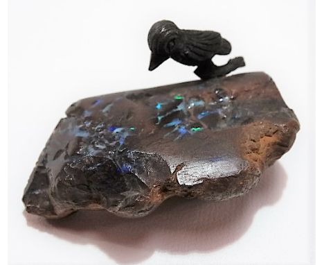 Australian boulder opal, applied with a metal bird, width 5.5cm.