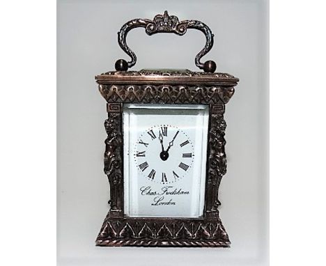 Ornately cast silver miniature carriage timepiece, the 1.5in white enamel dial with Roman Numerals signed Chas Frodsham, Lond