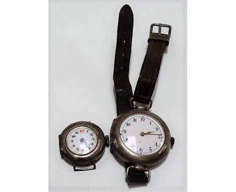 Early 20th Century silver lug wristwatch with 25mm white enamel dial with Arabic numerals, hallmarked Birmingham 1918; togeth