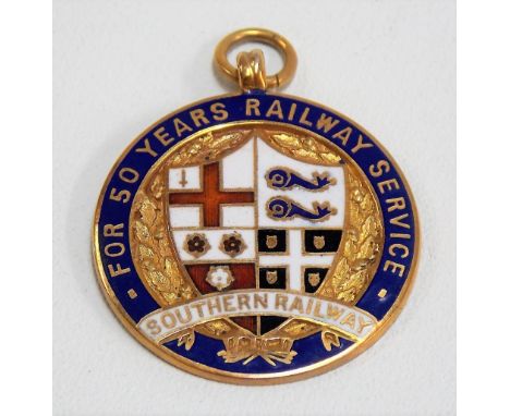 9ct hallmarked gold and enamel fob inscribed in coloured enamels 'FOR 50 YEARS RAILWAY SERVICE, SOUTHERN RAILWAY', engraved t