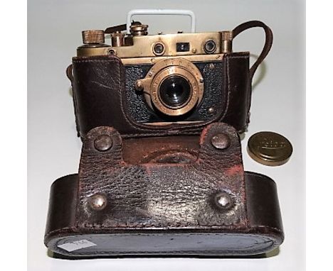 Leica replica military copy manual camera, inscribed Kriegsmarine no. 345458 and within leather case and with spurious Third 