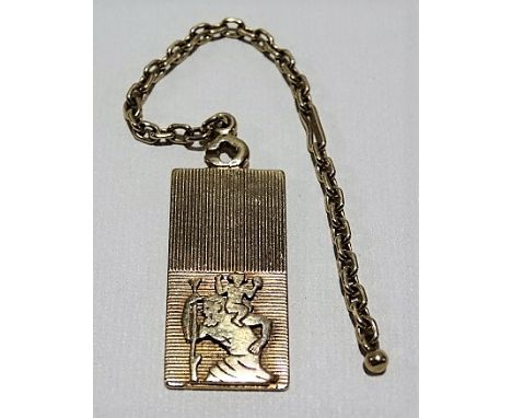 15ct gold engine turned rectangular St. Christopher pendant with applied yellow metal short chain, stamped 585, weight overal