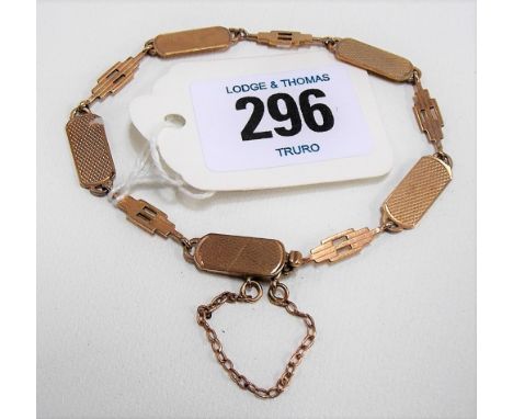 9ct rose gold Art Deco bracelet with engine turned links, stamped 9ct P.P. Ltd, weight 7g approx