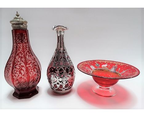Edwardian silver encased, pierced and engraved cranberry glass bottle vase, hallmark Birmingham 1902 and incised date 1907, h