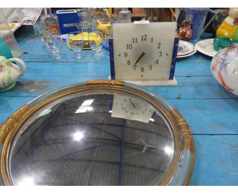 An Art Deco Onyx Mantle Clock and a Circular Convex Mirror in French Deco frame