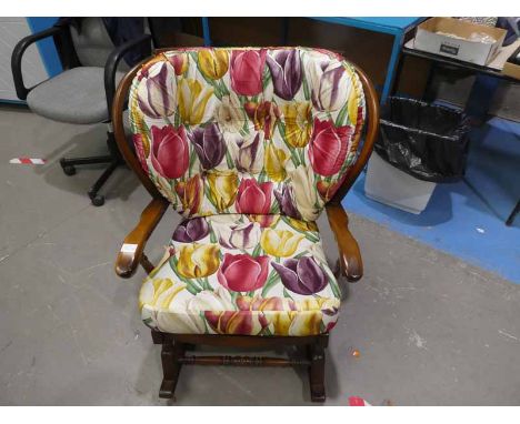 An Ercol type Spindle back Rocking Chair, upholstered similar to previous lot