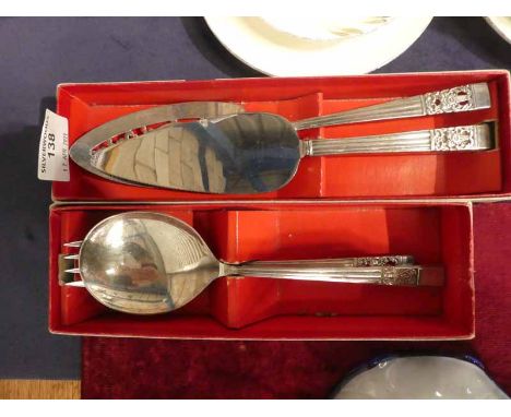 A Community Plate, boxed. Large Spoon, Fork and Salad Server, boxed. Cake slice and fish slice