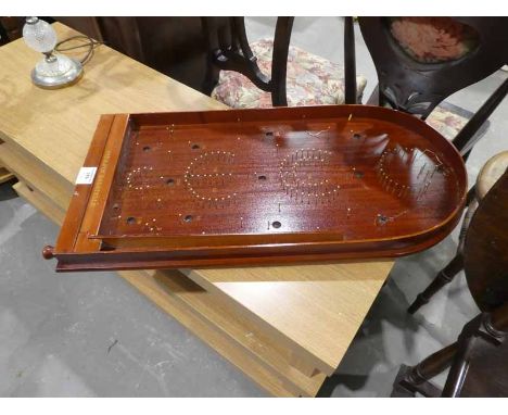 A Hit-a-Pin Bagatelle Game