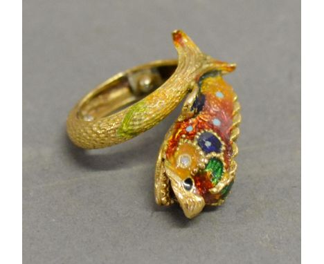 An 18ct. gold ring in the form of a fish, enamel decorated and with diamond eyes. 9.7 gms 