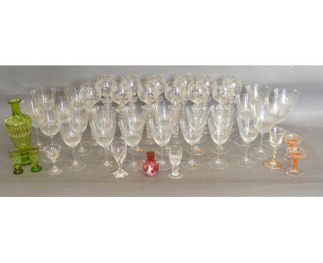 A Glass Drinking Set together with a set of twelve cut glass Hock glasses with grapevine etching 