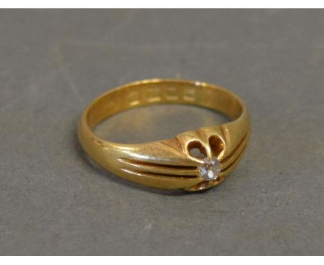 An 18ct. Yellow Gold Solitaire Diamond Gypsy Ring 