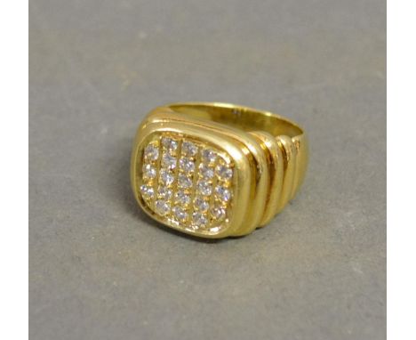 An 18ct. Gold Diamond Set Signet Ring set with five rows of diamonds 