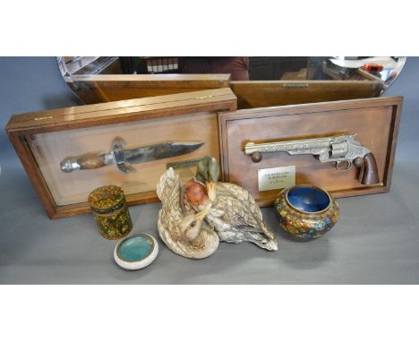 A Franklin Mint Model Of The Jim Bowie Knife, together with a similar Wyatt Earp Revolver, a shaped mirror and other items 