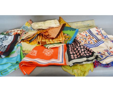 A Collection Of Silk Scarves And Other Textiles 