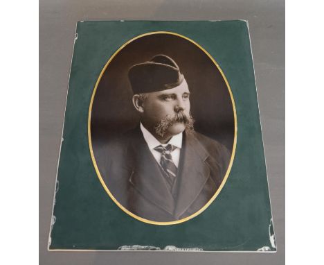 A German Porcelain Rectangular Plaque with oval half length portrait of a gentleman, 36 x 29 cms 