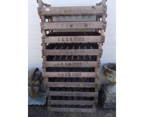 Ten potato crates, for A G &amp; M Fisher, 16cm H, 75.5cm W, 45cm D.