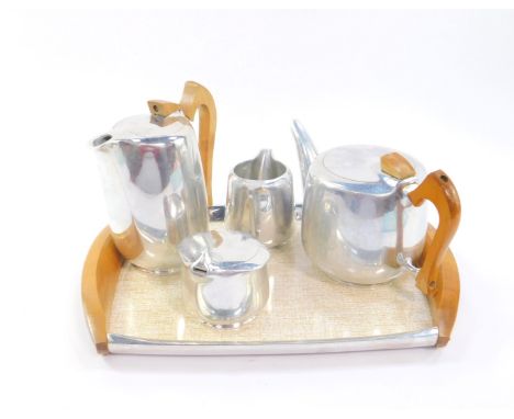 A Picquot ware five piece tea set, comprising twin handled tray, tea pot, hot water jug, cream jug, and sucrier.