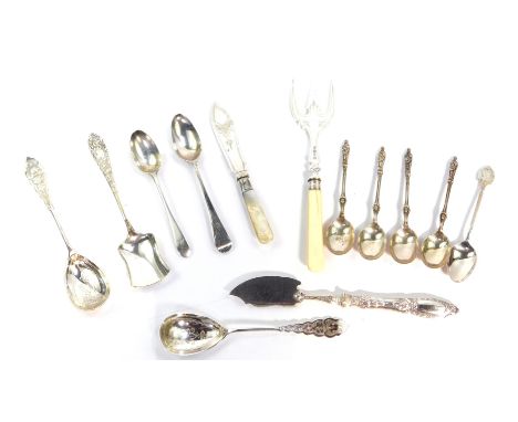 A set of four George V silver apostle tea spoons, Sheffield 1923, and two Georgian silver tea spoons, 2.58oz, together with p