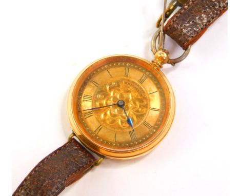 A lady's 18ct gold cased pocket watch, by E. Morris, Brighton, open faced, key wind, engraved floral dial with chapter ring b