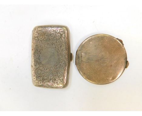 A George V silver cigarette case, foliate engraved, circular reserve, Birmingham 1920, and a George VI silver compact, with e