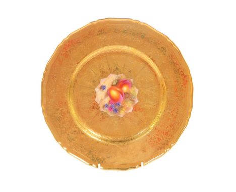 A Royal Worcester porcelain cabinet plate, circa 1958, painted by Freeman, with fruit, within a tooled gilt ground and border