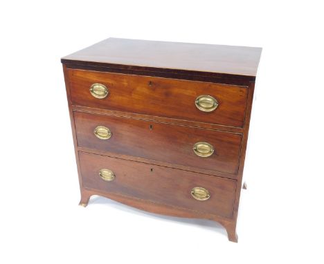 A George III mahogany chest, of three graduated drawers with boxwood line inlay, oval plate and ring handles, raised on splay