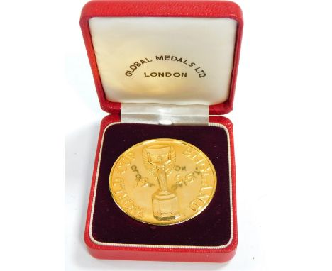 A Global Medals Limited World Cup 1966 commemorative medallion, gilt metal, the obverse showing the Jules Rimet Trophy, rever