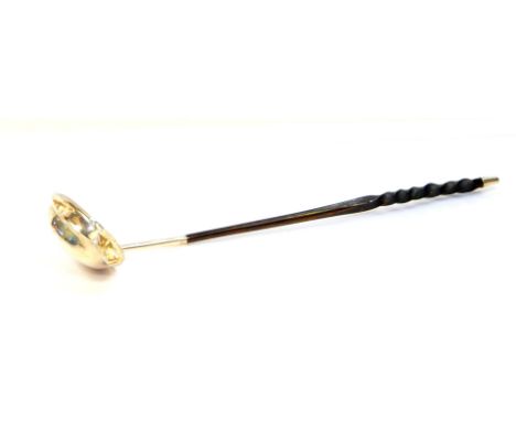 A Georgian silver and whale bone handled toddy ladle, hallmarks indistinct, 33cm L.  (AF)