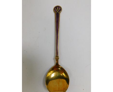 A Danish silver gilt and purple guilloche enamel salt spoon, bears hallmarks, 12.5cm L. (AF)