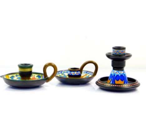 A Gouda Pottery candlestick, decorated in the Simple pattern, of waisted form, on an integral drip base, No 1137, 10.5cm H, t