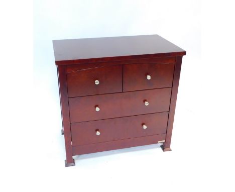 An Izziwotnot mahogany chest of drawers, with two short over two long drawers, raised on square legs and outswept square feet