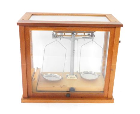 A set of Gallenkamp chemical balance scales, cased, with a box of weights, case 40cm H,  45cm W, 23.5cm D.