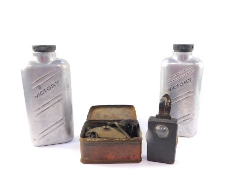 Two Victory heavy aluminum bottles,  with screw fitting rubber caps, an original Prima stove in tin and a battery operated si