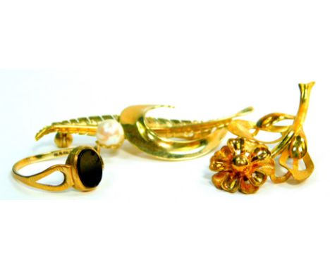 A 9ct gold floral brooch, 9ct gold and pearl set brooch, in a leaf and scroll form and a girl's 9ct and black onyx ring, size