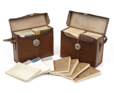 A rare pair of veteran cased motoring maps by W &amp; A K Johnston, circa 1900,the brown leather cases in very good order wit