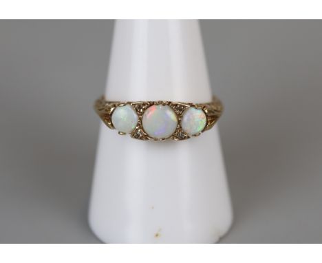 Gold opal and diamond set ring - Size P