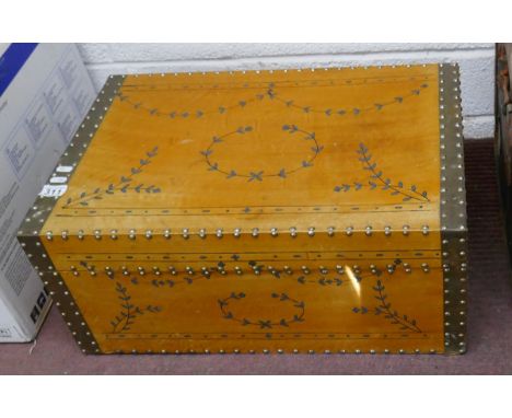 Painted and studded tan trunk 