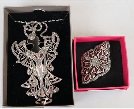 Large silver Art Nouveau pendant on chain together with silver and garnet brooch 