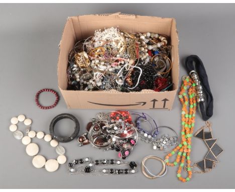 A box of assorted costume jewellery, to include necklaces, bangles, bracelets, beads etc.  