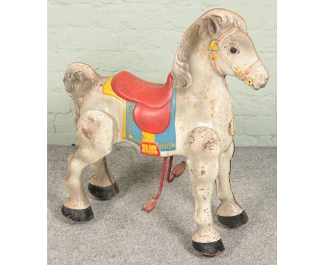 A 1950s painted tin plate Mobo toy horse.  