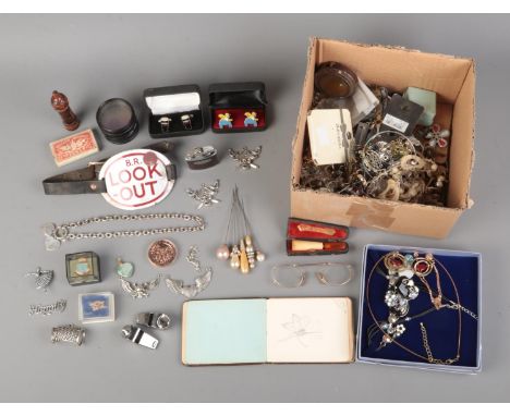 A collection of assorted costume jewellery and collectables to include cheroot holder, Omega light, necklaces, rolled gold ba