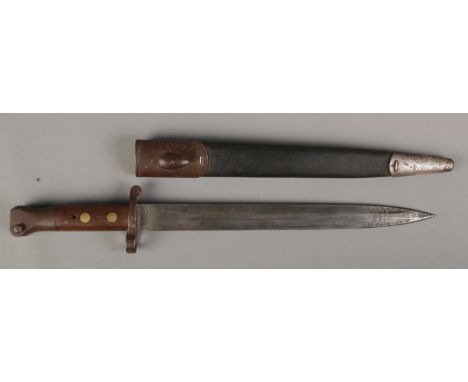 A British 1888 pattern Lee Metford bayonet by Mole, with scabbard. Blade length 30cm. CANNOT POST OVERSEAS  