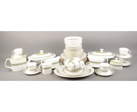 A Royal Doulton ceramic dinner service in the 'Rondelay' pattern. To include plates, cups and saucers, tureens, teapot and mi