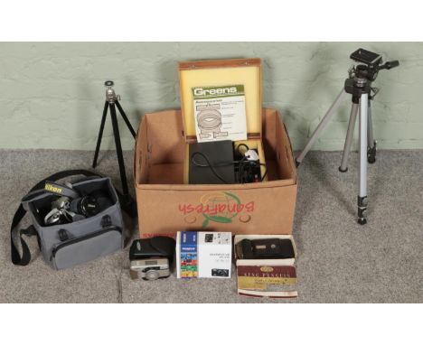 A small quantity of cameras and projection equipment. Includes cased Greens Spotlight 3000 projector, Nikon F65 SLR camera, t