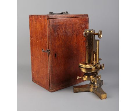 A cased R &amp; J Beck cased brass microscope with selection of accessories and lenses.  Not all accessories are present.