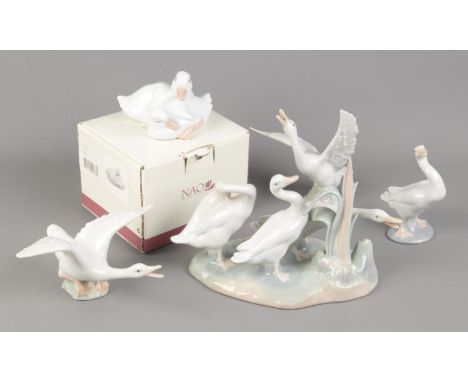A collection of Lladro geese together with a boxed Nao figure of two ducks.  