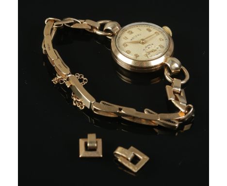 A ladies 9ct gold Rotary manual wristwatch with expanding strap and two extra links. 18.6g gross weight.  