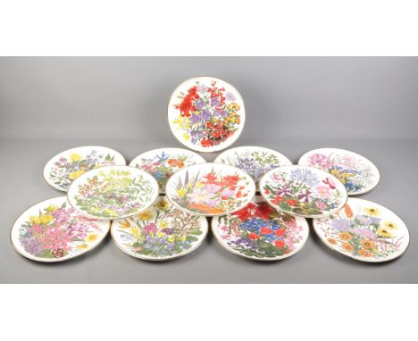 Franklin Porcelain; twelve RHS 'Flowers of the Year' cabinet plates, depicting flowers of the month, most with leaflets.  Mis